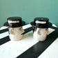 Pair of Vintage Ceramic ‘Old Wooden Head’ Salt and Pepper Shakers