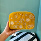 Mustard Yellow Velvet Alchemy Makeup Bag by Elizabeth Scarlett London